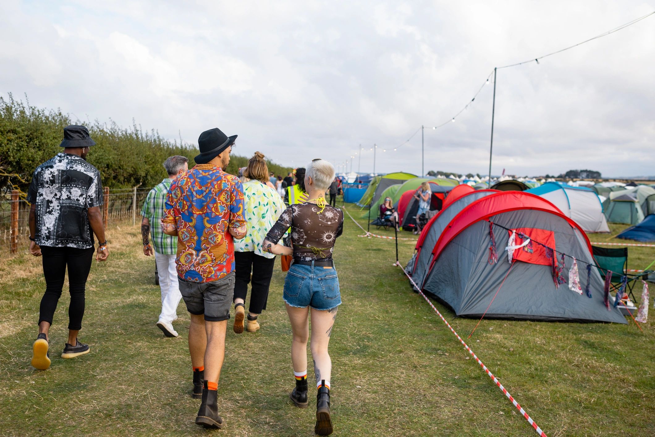 Festival crowd walking toward event activities